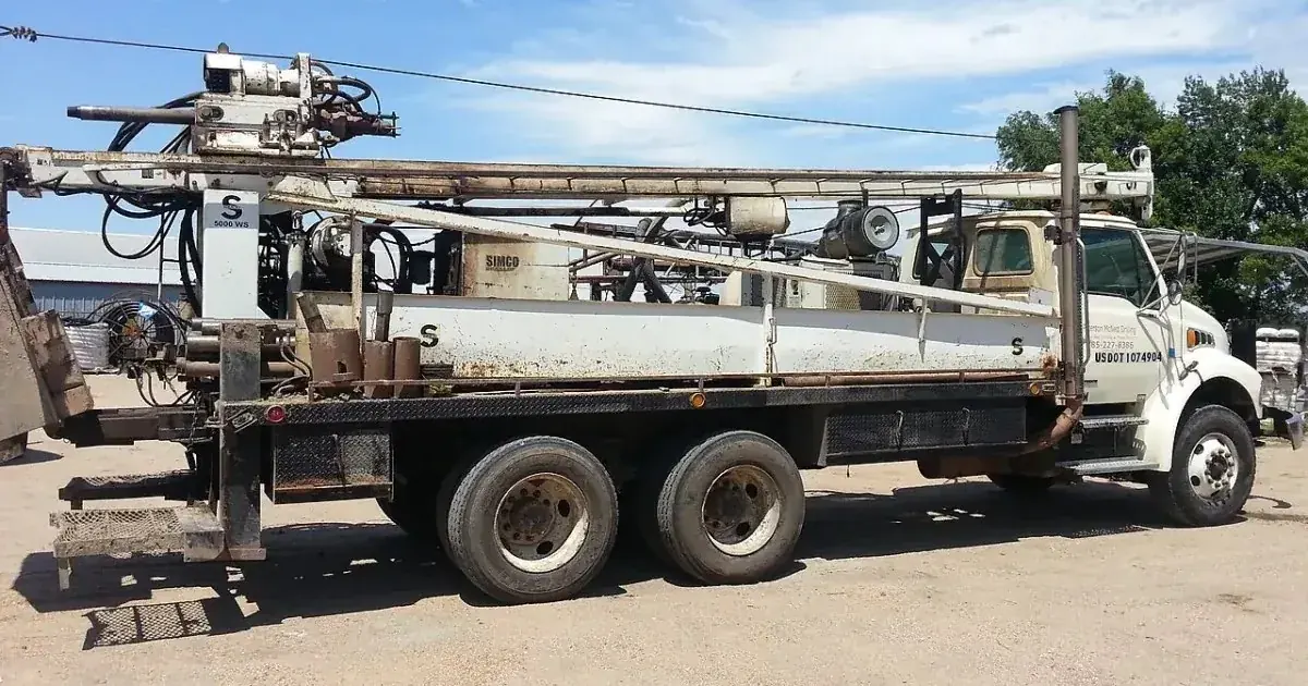 Water well drilling rig set up on a dry job site serving El Paso TX